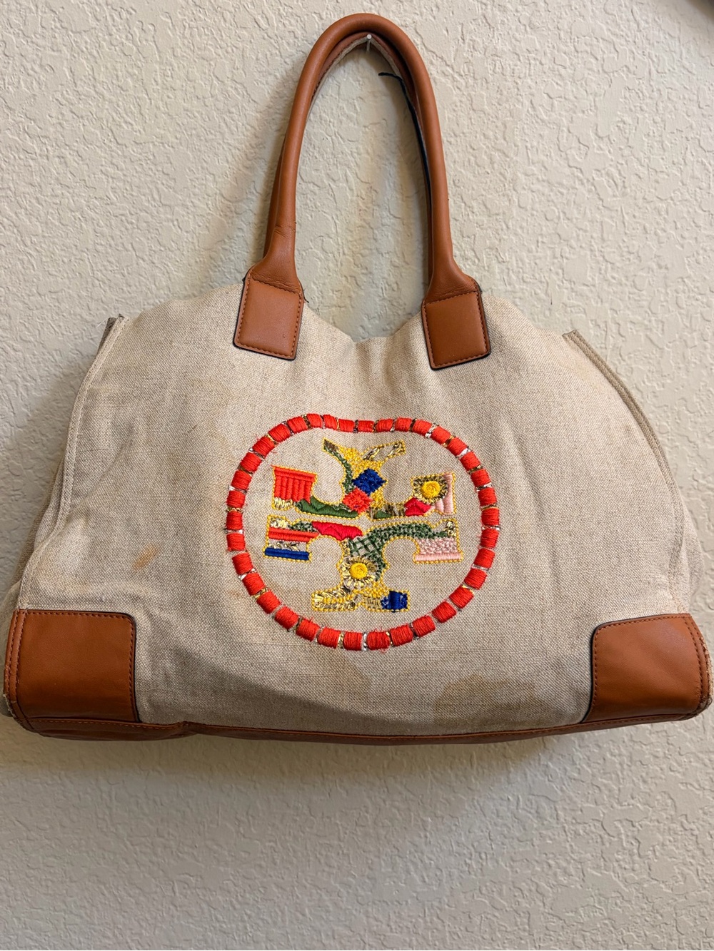 Tory Burch Beige Canvas Tote with Brown Leather Trim and Embroidered Medallion